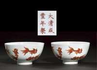 19th century A pair of iron red and white glazed bowls